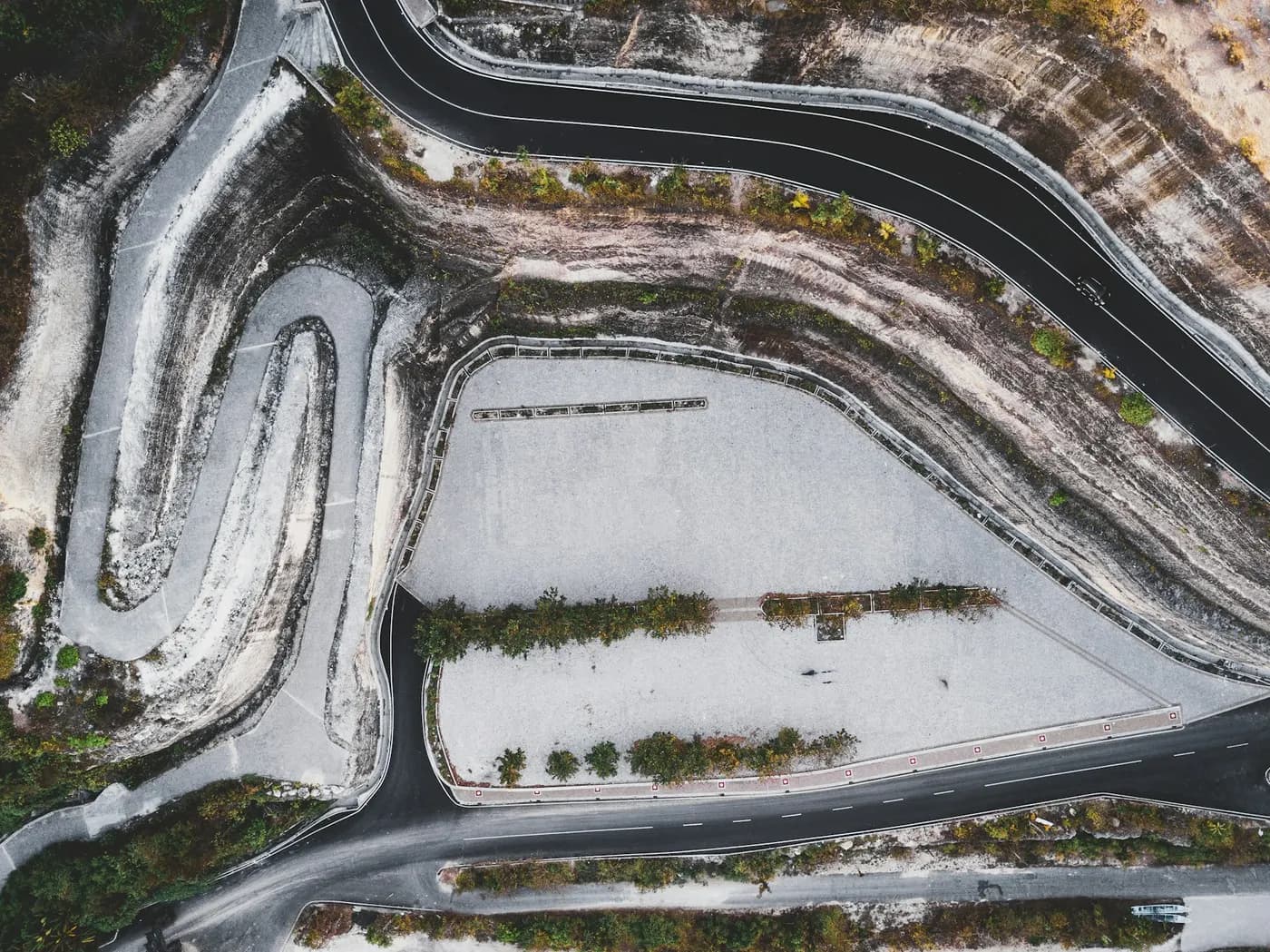 Aerial view of terraced quarry slopes and haul roads